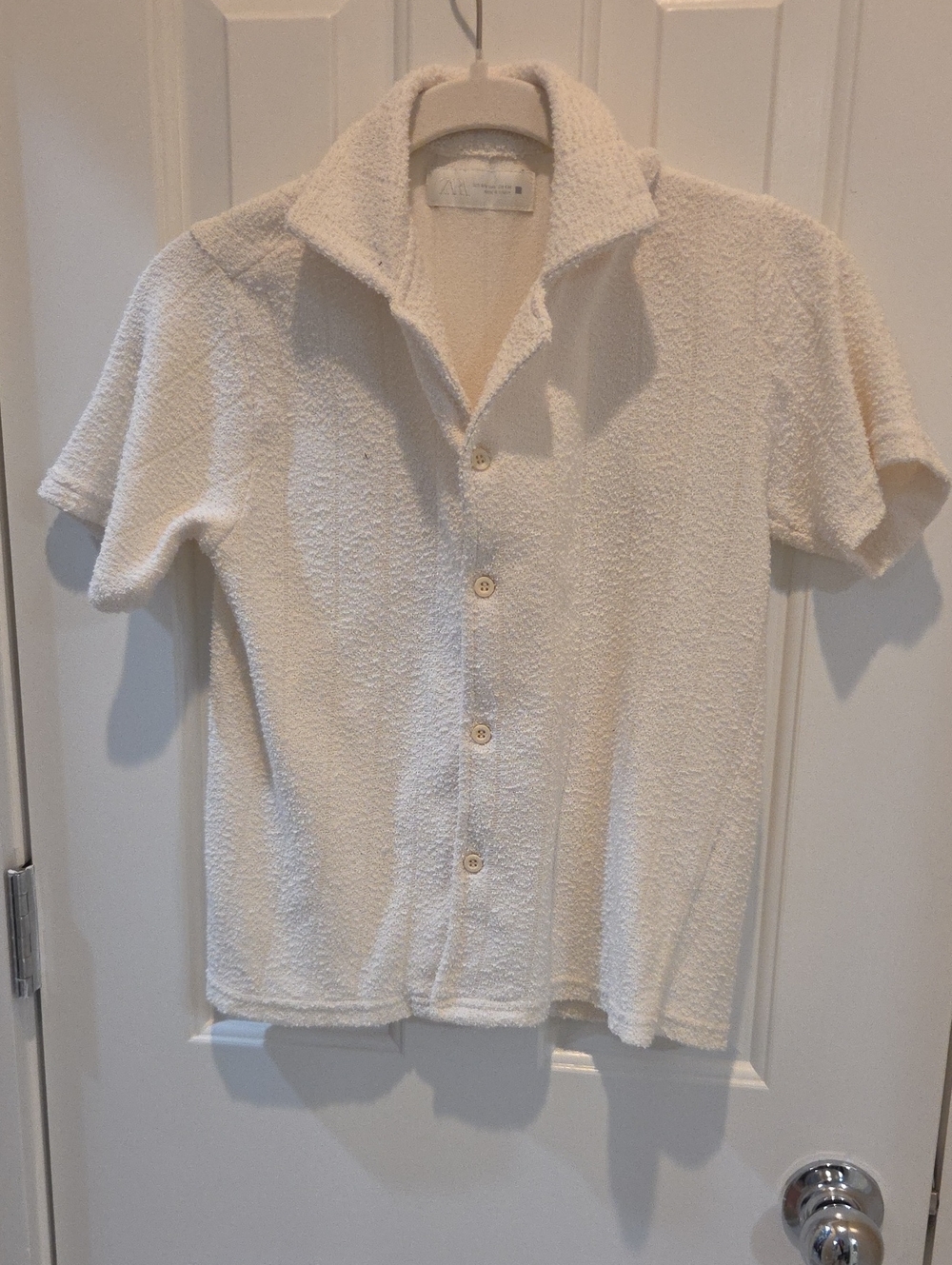Zara Kids bouclé textured short-sleeve button-up shirt in an ecru/cream tone.